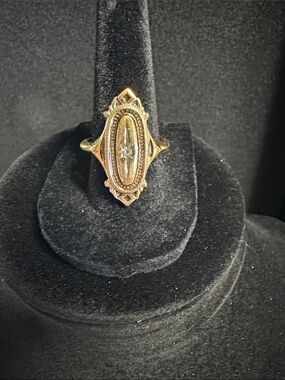 Vintage 1976 Avon Adjustable  Gold-Tone Kensington Ring with Rhinestone Center